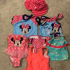(4) Swimsuits + Swim Hat.  Toddler size 18M-2T